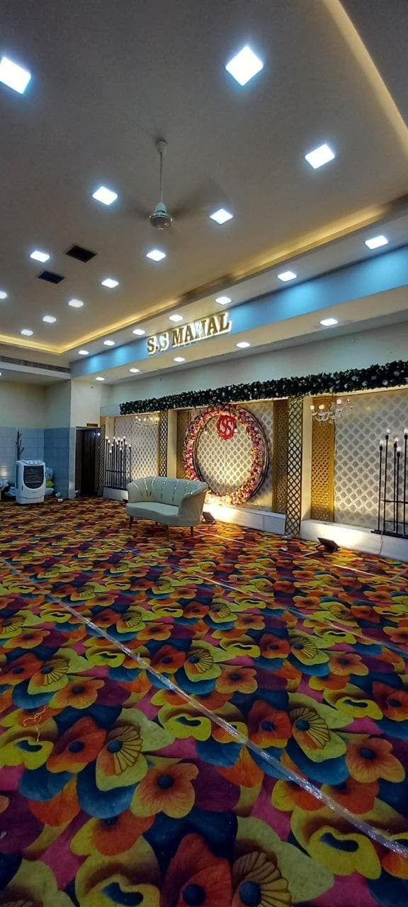 Colourful carpet to the stage at S.S Mahal