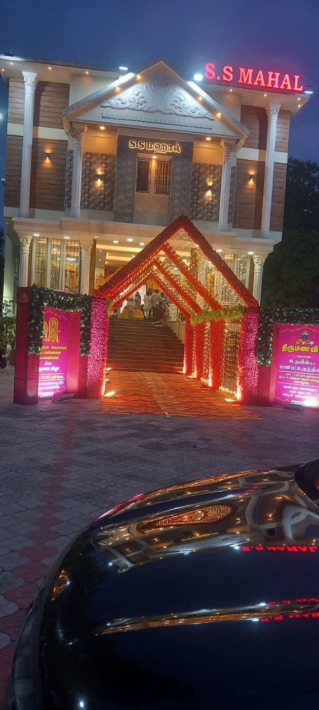 Red arch entrance at night at S.S Mahal