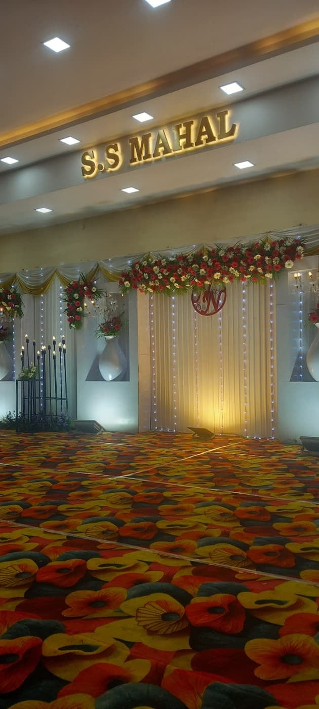 Stage with a floral carpet at S.S Mahal